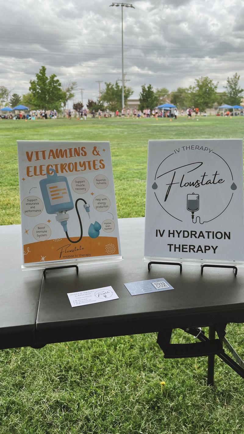 Laticia at the Flowstate booth during a kickball tournament