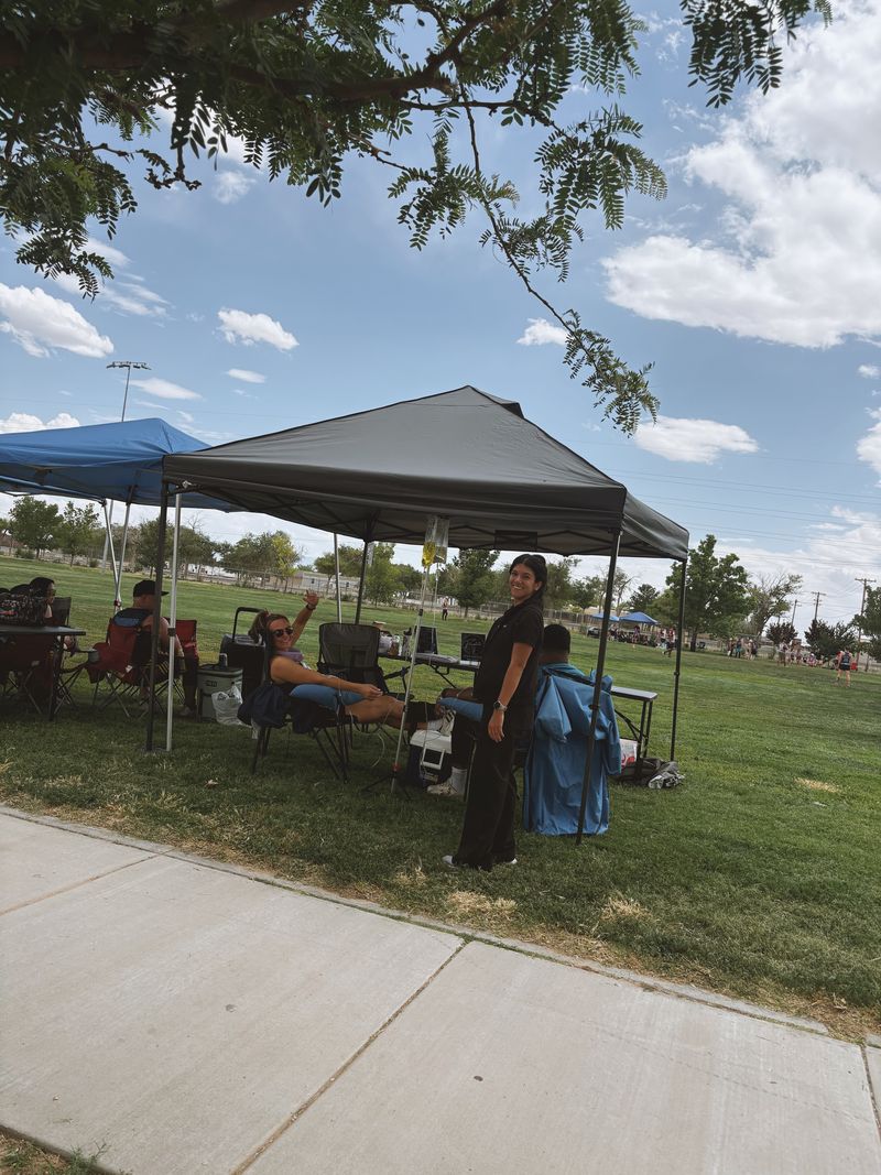IV bag set up at the Flowstate booth during a kickball tournament